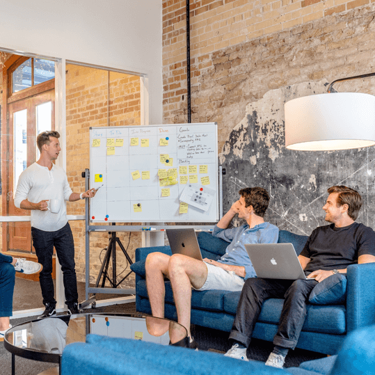 Three men in a meeting