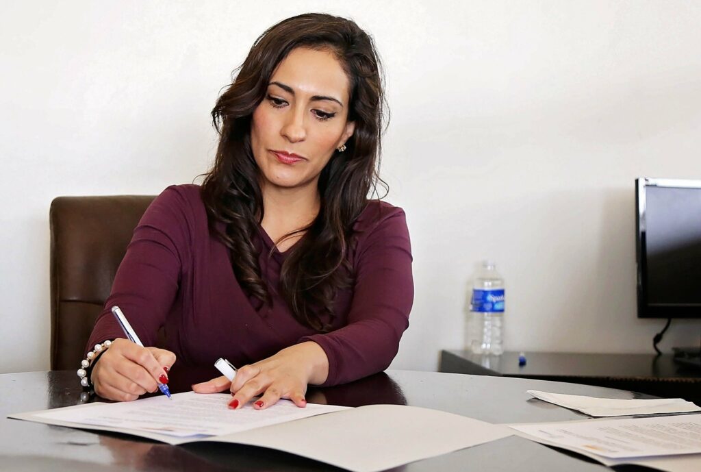 A woman filling out a form