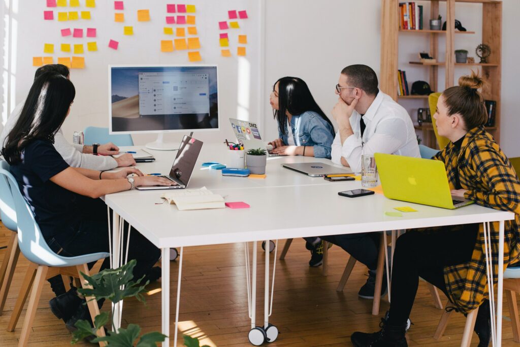 People looking at a screen in a meeting