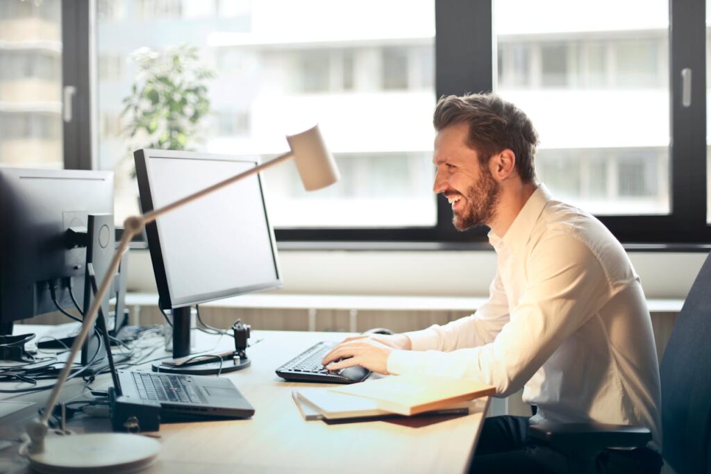 A man using his PC at work