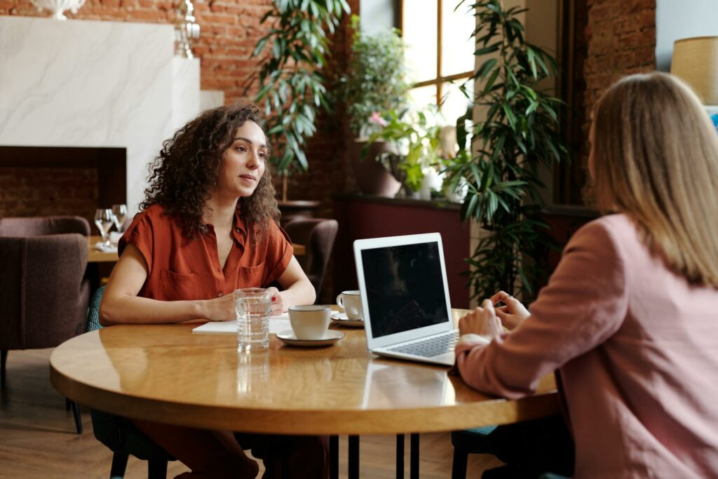 Employees in a meeting at a Café