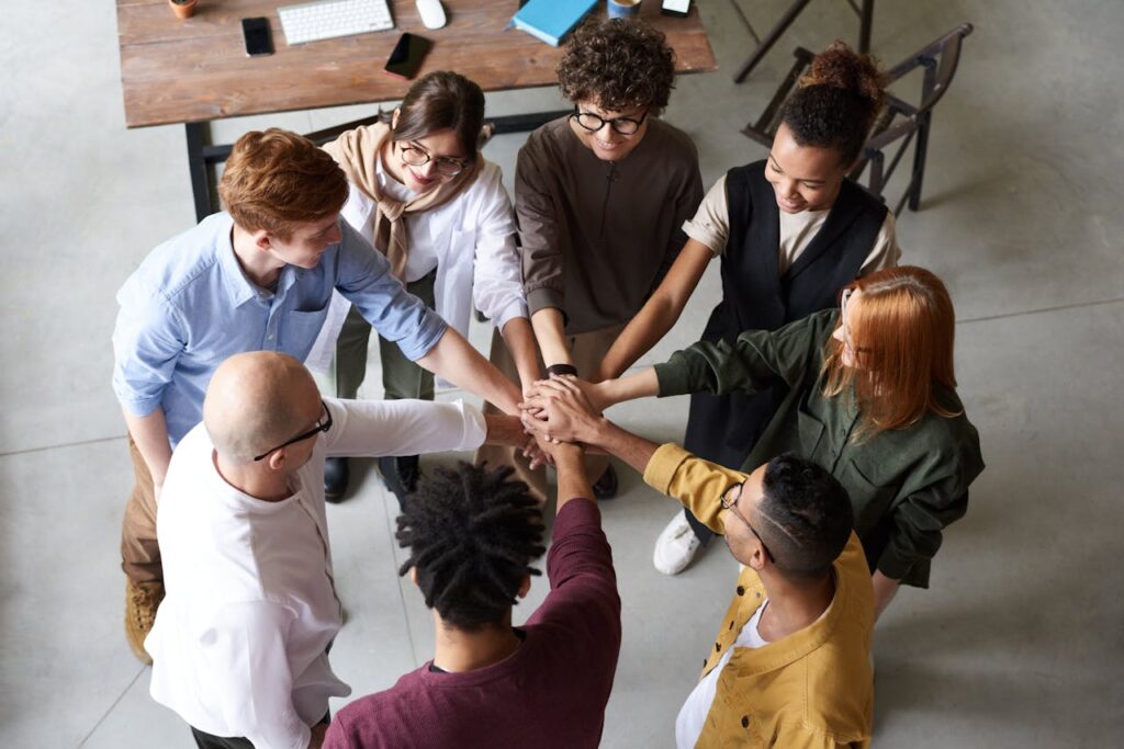 People putting their hands together