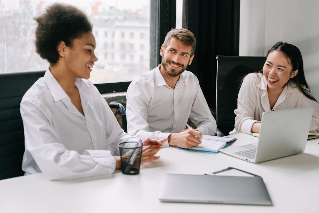 Three people in a meeting