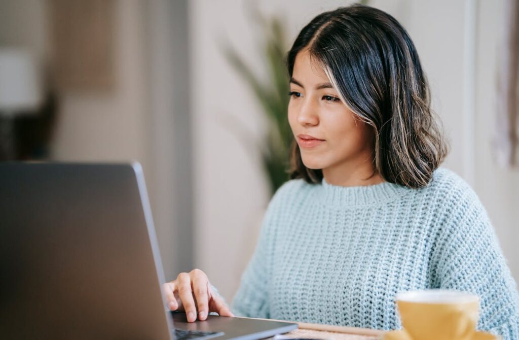 A woman using a laptop