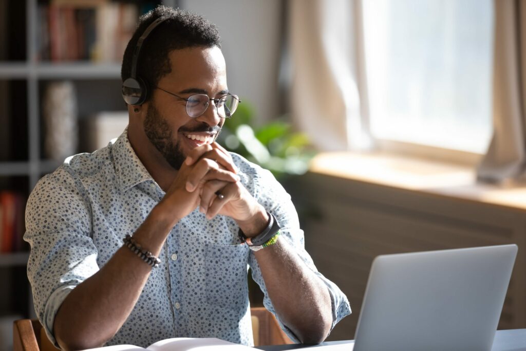 A man in a remote meeting