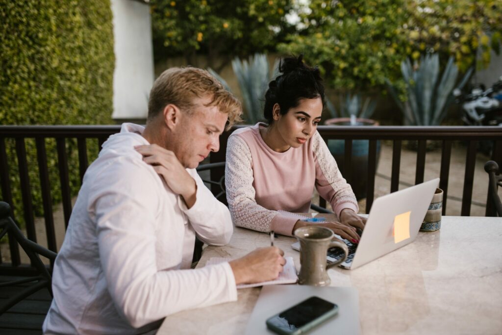 Two employees working outside