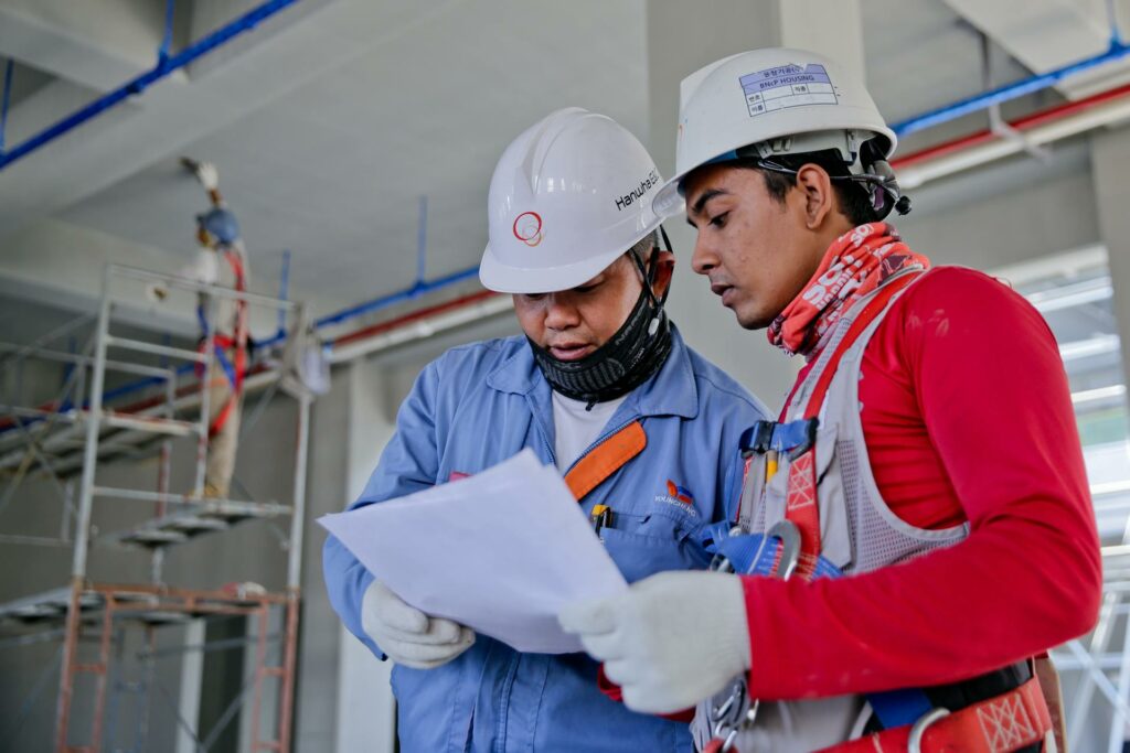Two construction workers